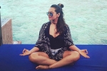 Sonakshi Sinha Maldives, Sonakshi Sinha news, sonakshi s latest look keeps the heat on, Practising yoga