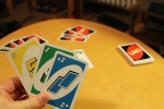 uno card game rules, uno game rules, uno gives official rule to play now you can end the game on an action card, Card game