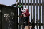 entering US via mexico, punjabis Crossing Border Fence, video clip shows punjabi women children crossing border fence into u s, Punjabis