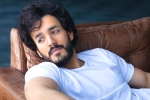 Akhil Akkineni next movie, Akhil Akkineni looks, akhil akkineni beefing up for his next, Nagarjuna