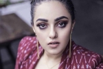 Nithya Menen movies, Nithya Menen in Jayalalithaa bipic, nithya menen stuns movie buffs with jayalalithaa s look in the iron lady, Tamil nadu chief minister