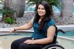 virali modi, Indian American, wheelchair bound indian american forced to stand at delhi airport, Paralyzed