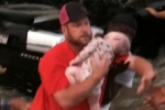 motorists saves life of babies, Dallas news, heroics of motorists rescues two babies, Texas news